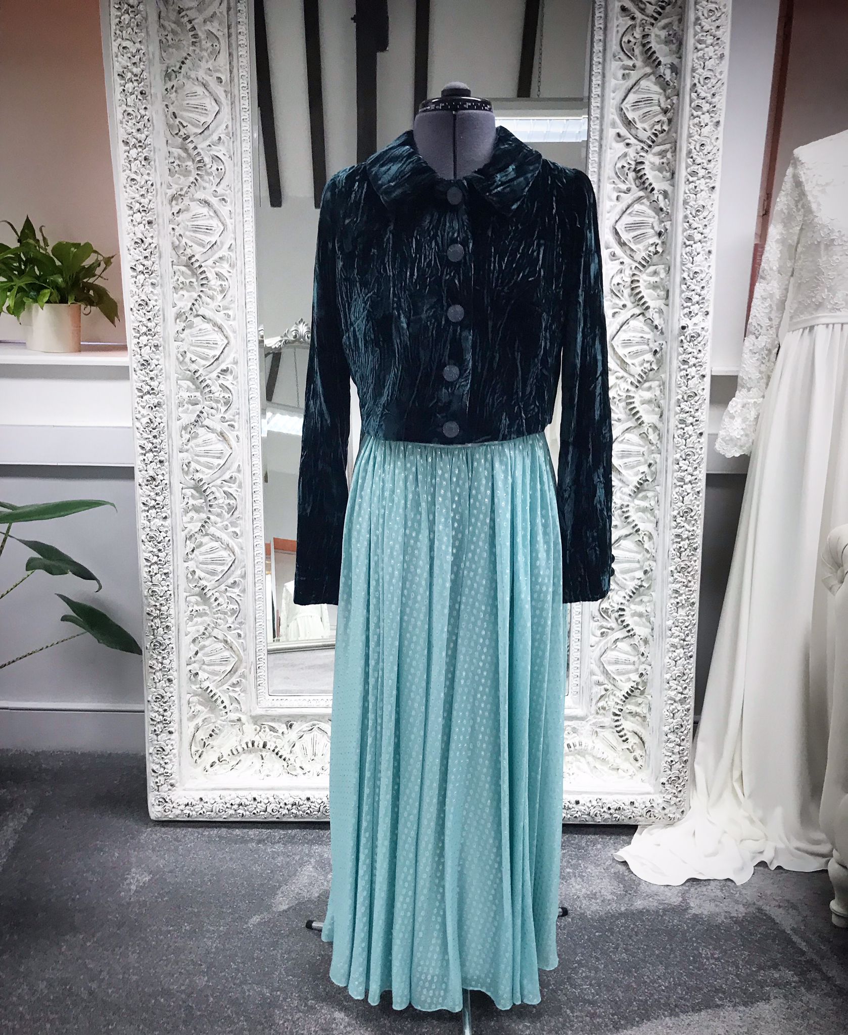 A Sister making a special effort with this crushed velvet cropped jacket and dress in an eye catching aqua chiffon with metallics woven in.
